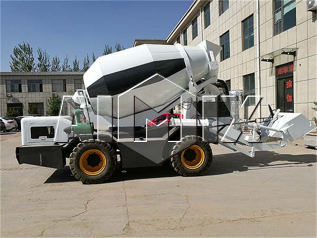 self loading concrete mixer machine